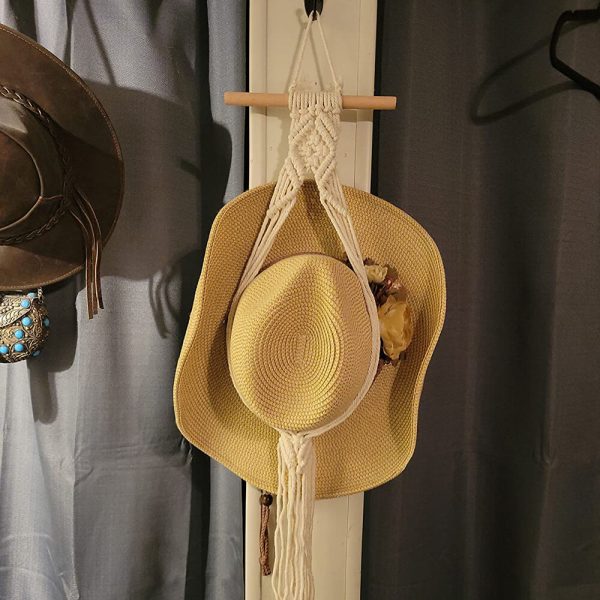 cowboy hats hanging on wall